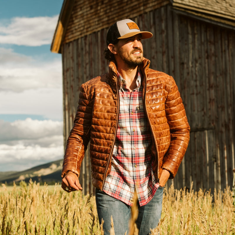 Authentic Buffalo Jackson Bridger Leather Down Jacket in light brown full-grain lambskin leather, worn out west — sold only at 