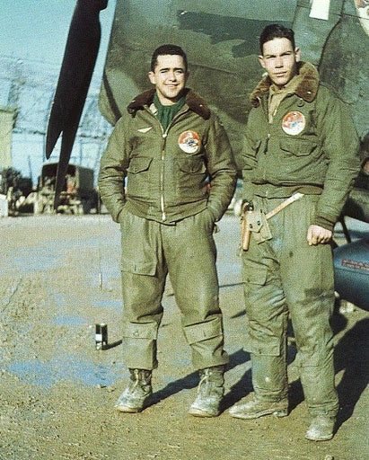 pilots wearing b-10 bomber jackets next to airplane